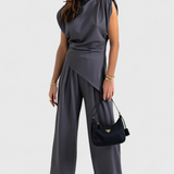 Asymmetrical Set with Draped Shoulders and Flared Pants in Gray