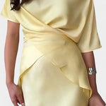 Two-Piece Ensemble with Crisscross Straps and Flowing Skirt, photo 2