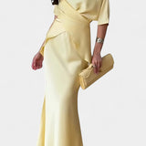 Two-Piece Ensemble with Crisscross Straps and Flowing Skirt, photo 3
