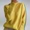 Adelheid Cable-Knit Turtleneck Sweater in Yellow