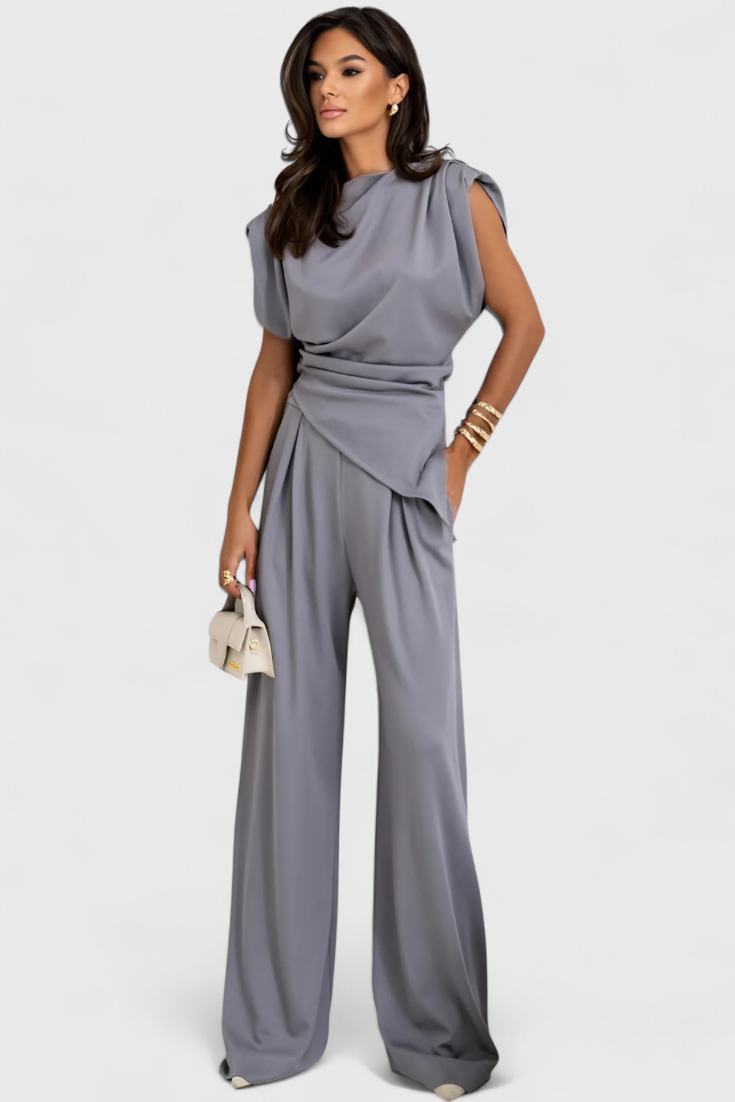 Asymmetrical Set with Draped Shoulders and Flared Pants in Light Gray