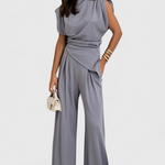 Asymmetrical Set with Draped Shoulders and Flared Pants in Light Gray