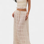 Halter Neck Pleated Ensemble with Flowing High-Waisted Skirt