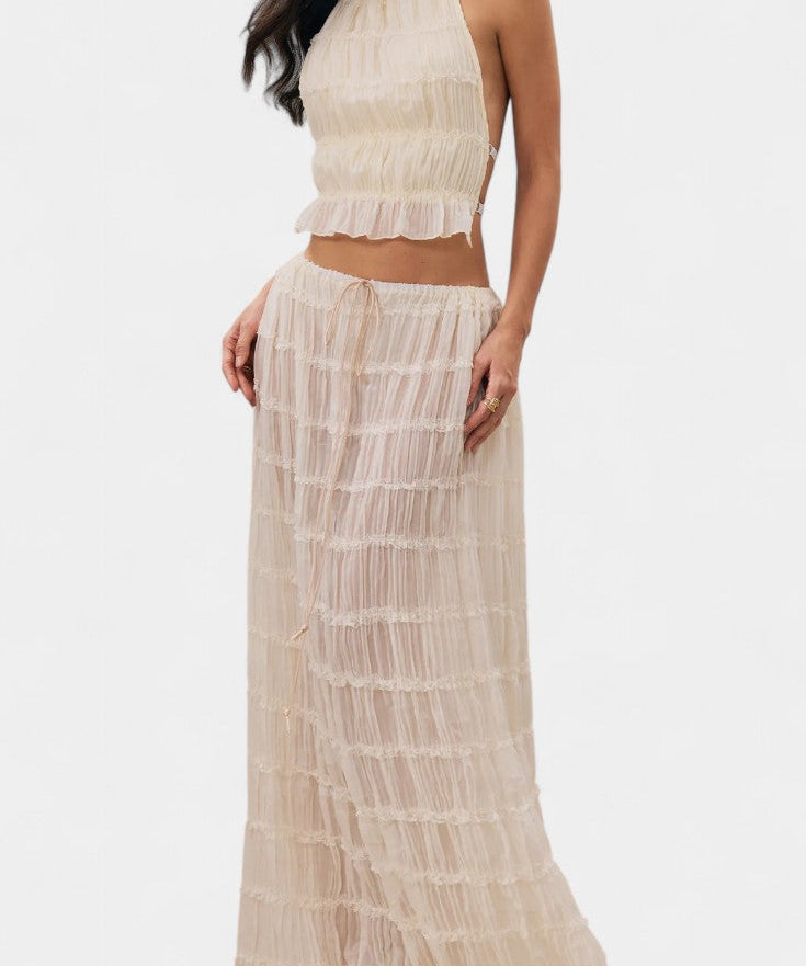 Halter Neck Pleated Ensemble with Flowing High-Waisted Skirt