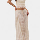 Halter Neck Pleated Ensemble with Flowing High-Waisted Skirt, photo 2