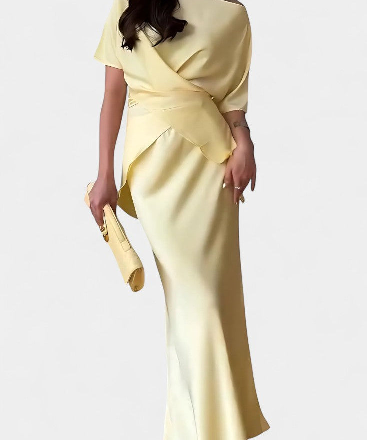 Two-Piece Ensemble with Crisscross Straps and Flowing Skirt in Yellow