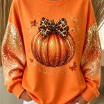 Women's Glitter Bow Pumpkin Sweatshirt in Orange