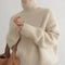 Dorothea Cable-Knit Turtleneck Sweater in Beige