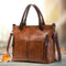 Angela Versatile Leather Handbag in Brown