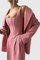 Three-Piece Suit Ensemble Featuring a Tailored Corset in Pink