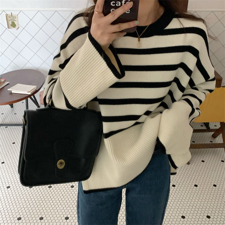 Lieselotte Cable-Knit Turtleneck Sweater in Cream