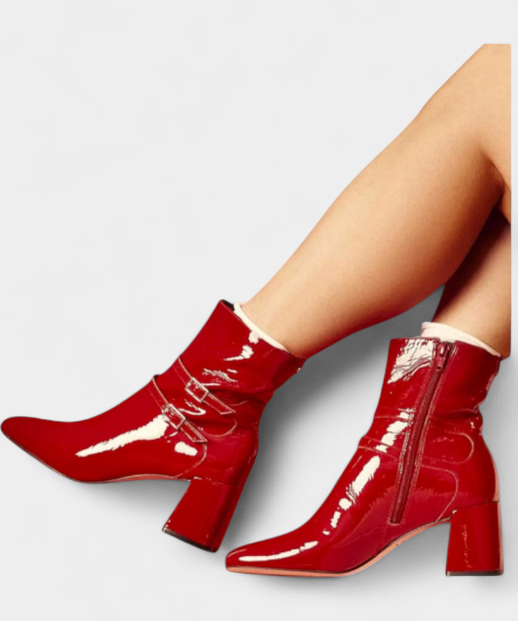 Red Heeled Boots Featuring a Striking Design